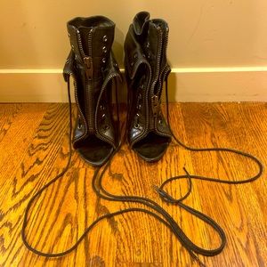 Alexander Wang black lace up open toe booties.